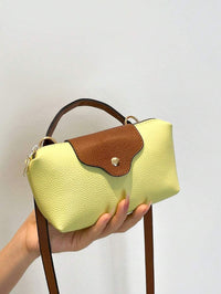 Mini waterdichte nylon tas voor dames met contrasterende details