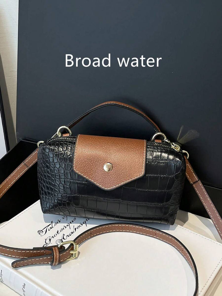 Mini waterdichte nylon tas voor dames met contrasterende details