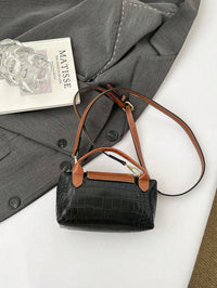 Mini waterdichte nylon tas voor dames met contrasterende details